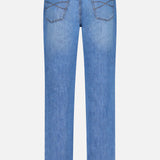 Back view of BRUNELLO CUCINELLI's Button Fly Denim Jeans in light blue, crafted from premium Italian denim, featuring two back pockets with crisscross stitching, a brown leather patch on the waistband, and straight-cut legs.