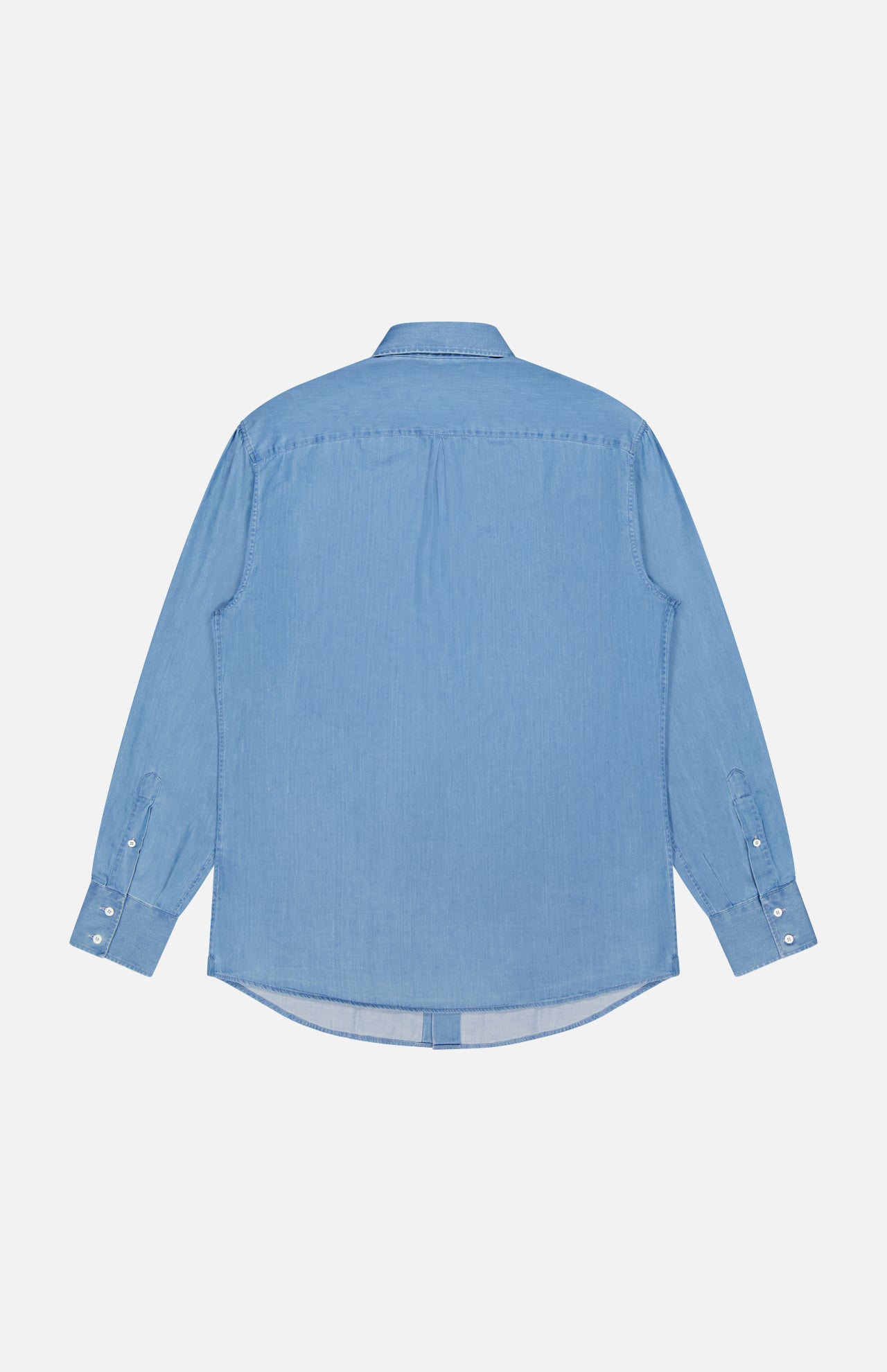 The BRUNELLO CUCINELLI Denim Button Down Shirt in light blue wash is laid flat on a white background, shown from the back with long sleeves, classic collar, and buttoned cuffs.