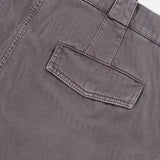 Close-up of a pair of BRUNELLO CUCINELLI Dyed Zigzag Cargo Trousers for men, featuring a brown cotton fabric with a waistband detailed with belt loops and a single back flap pocket, set against a white background.