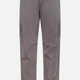 The Dyed Zigzag Cargo Trousers by BRUNELLO CUCINELLI feature a classic straight-leg silhouette with side pockets, a button and zip fly, and belt loops, reminiscent of traditional Italian cargo trousers. Shown here in gray against a plain white background.