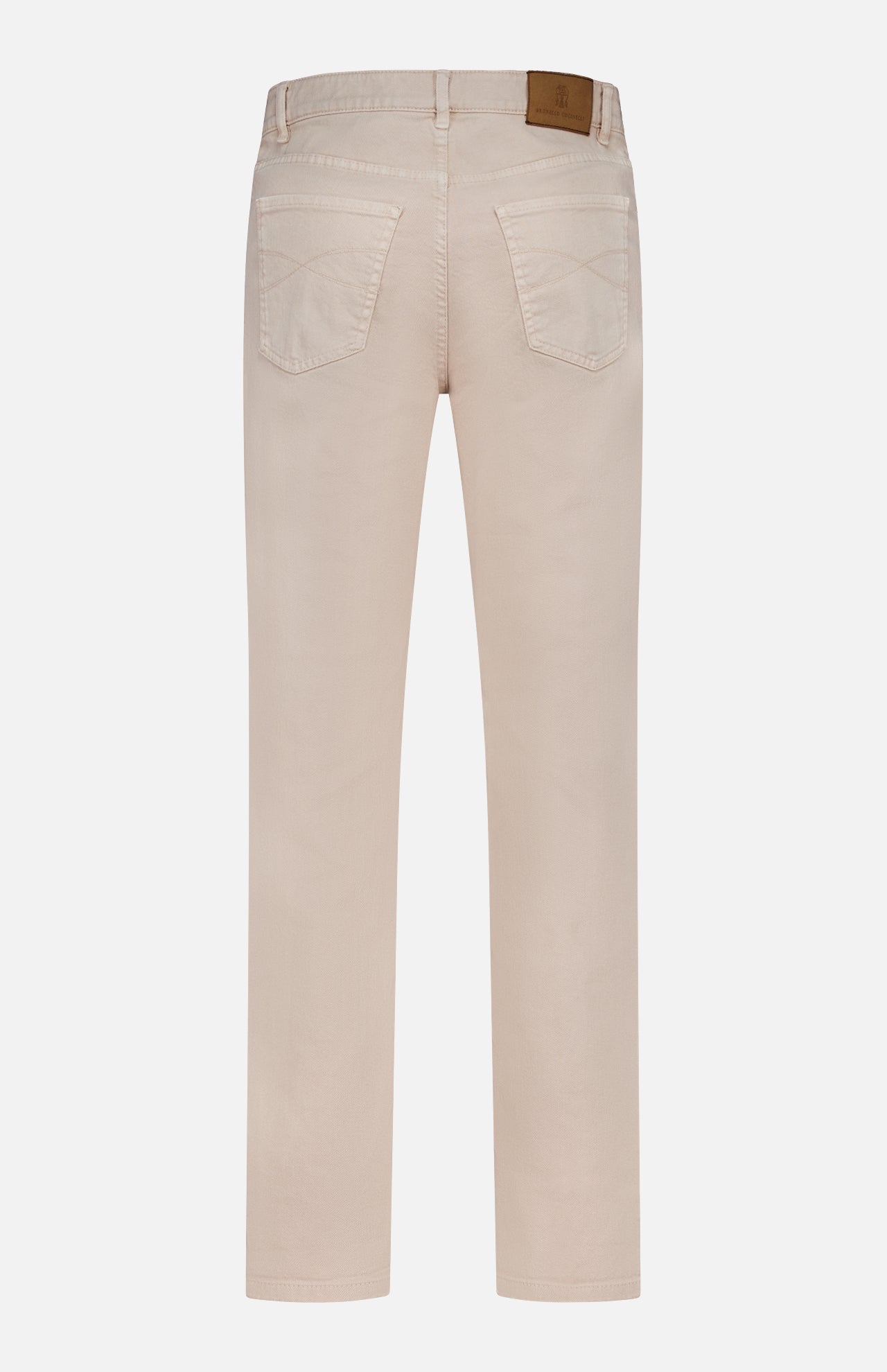 Back view of the Button Fly Dyed Denim Pants by BRUNELLO CUCINELLI in light beige, expertly crafted from premium Italian denim and featuring two back pockets along with a brown leather patch on the waistband—a signature detail that reflects the brand’s refined style.