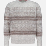 The Fair Isle Crewneck Sweater by BRUNELLO CUCINELLI features a classic silhouette in light gray, adorned with horizontal brown and beige geometric motifs inspired by Nordic jacquard patterns, and finished with ribbed collar, cuffs, and hem.