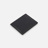The BRUNELLO CUCINELLI Leather Cardholder with Middle Slot is a slim, black leather accessory featuring multiple card slots and subtle red edge stitching, displayed at an angle on a plain white background.