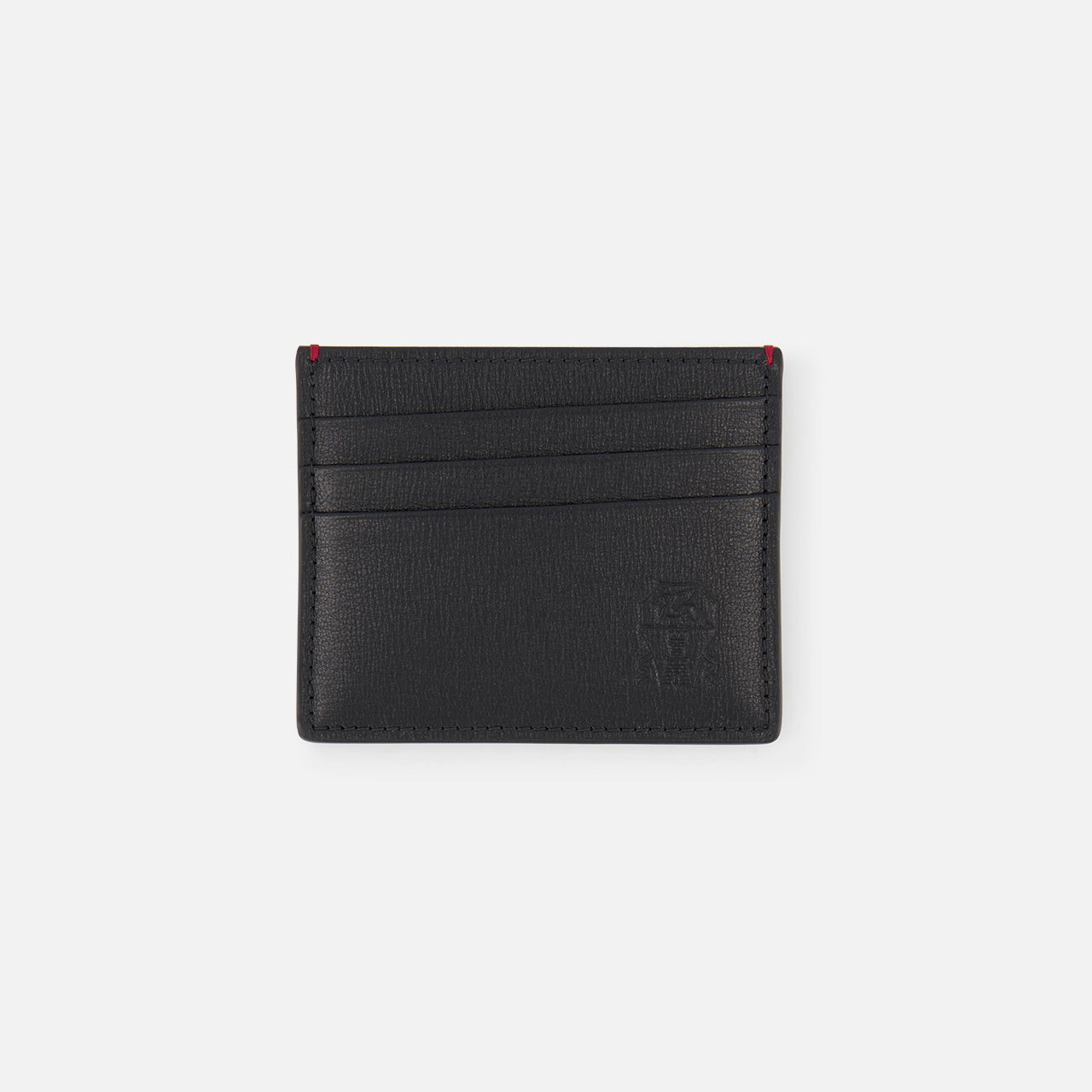 The BRUNELLO CUCINELLI Leather Cardholder with Middle Slot features black leather, three horizontal slots per side, subtle embossed branding at the bottom right, and red accents on the top corners, shown against a plain white background.