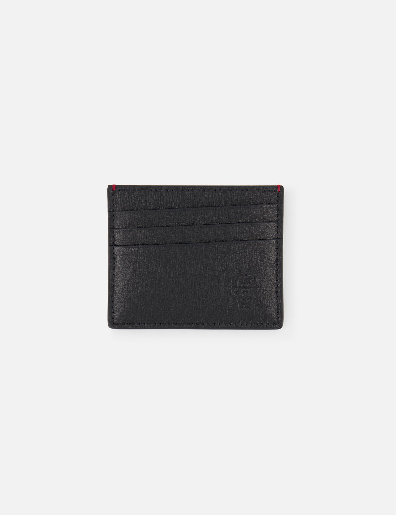 The BRUNELLO CUCINELLI Leather Cardholder with Middle Slot features black leather, three horizontal slots per side, subtle embossed branding at the bottom right, and red accents on the top corners, shown against a plain white background.