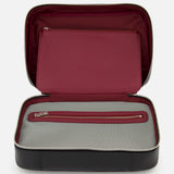 The BRUNELLO CUCINELLI Leather Dopp Kit is a black Italian-made toiletry bag with a burgundy interior, top zippered pocket, and bottom mesh zip compartment—combining style and function for travel.