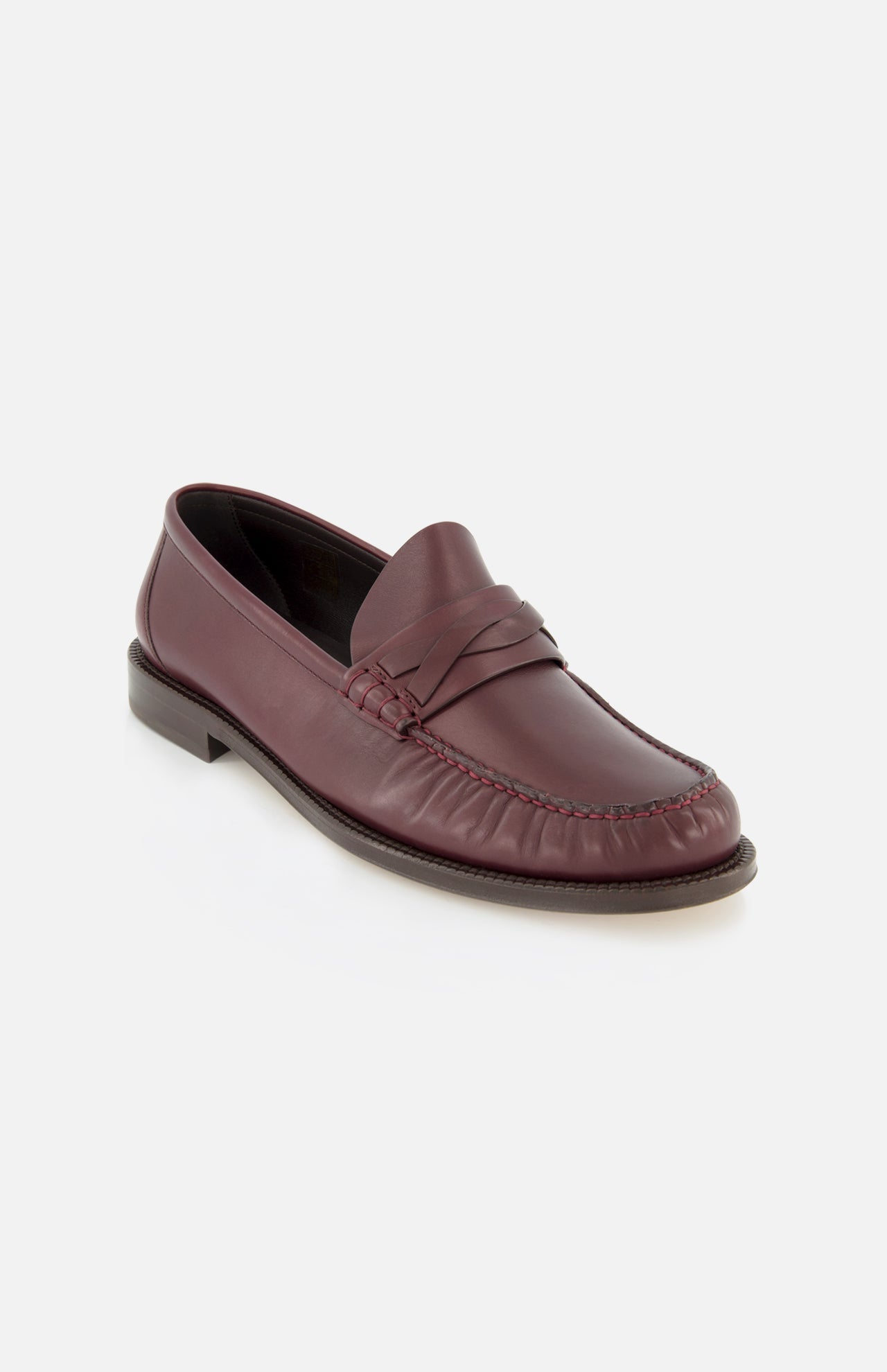 The BRUNELLO CUCINELLI Leather Woven Band Loafers are a menswear classic, crafted in Italy from burgundy leather with a woven band and moccasin-style stitching, shown on a white background for timeless style.