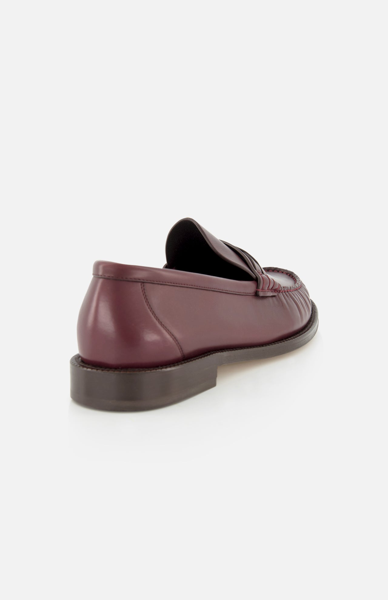 The BRUNELLO CUCINELLI Leather Woven Band Loafers are shown from the back side angle, featuring a smooth maroon finish, low heel, and classic design against a plain white background.