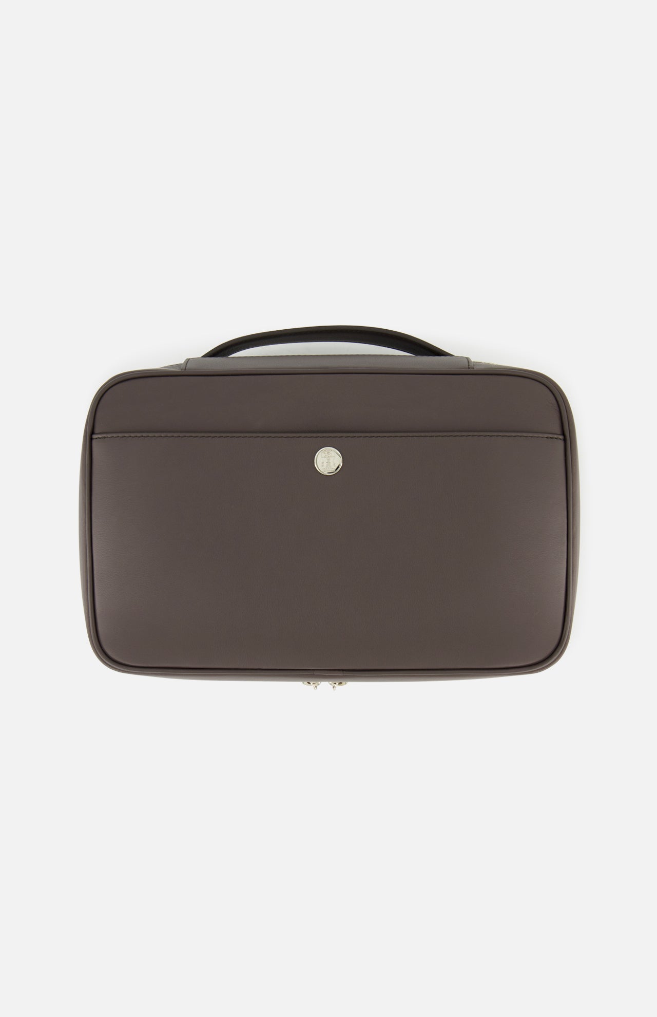 The BRUNELLO CUCINELLI Leather Travel Bag is a brown leather briefcase with a top handle and a front pocket, distinguished by a small circular silver emblem at its center. Exuding sophistication and practicality, this men's travel accessory is ideal for those who value the refined style associated with luxury travel beauty cases.