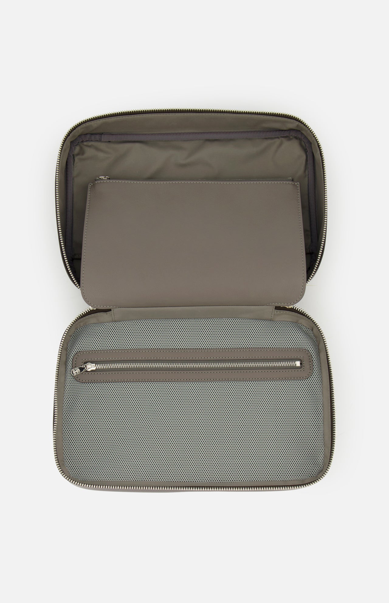 Introducing the BRUNELLO CUCINELLI Leather Travel Bag: an open gray zippered case featuring a fabric-lined interior, a mesh zippered pocket on the bottom half, and a flat pocket on the top half. Ideal as a sophisticated men's travel accessory or as an alternative to classic leather toiletry bags, this luxury beauty case is empty and showcased against a plain white background.