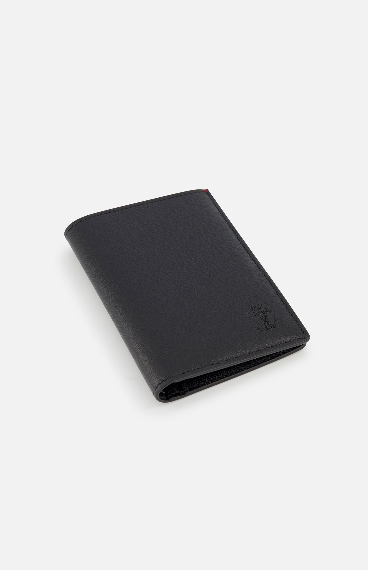 A closed BRUNELLO CUCINELLI Leather Wallet and Passport Holder, in black leather with a subtle embossed logo at the bottom right corner, is photographed on a plain white background. Made in Italy.