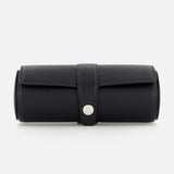 The BRUNELLO CUCINELLI Leather Cylinder Watchcase in black leather features a secure strap and silver button closure, ideal for travel watch storage. Shown on a plain white background.