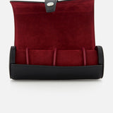 The BRUNELLO CUCINELLI Leather Cylinder Watchcase features a black and red leather design, button closure, soft red interior, and compartments—perfect for securely storing multiple watches while traveling.