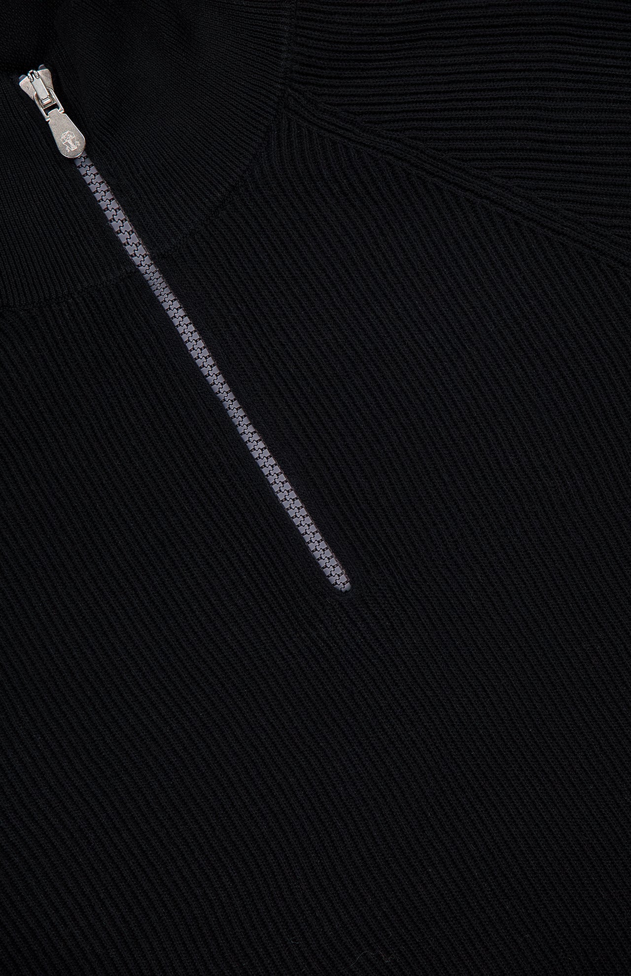 Close-up of the BRUNELLO CUCINELLI Quarter Zip Pullover Sweater in black, featuring ribbed fabric and a partially unzipped silver zipper, showcasing the sweater's detailed texture and design.