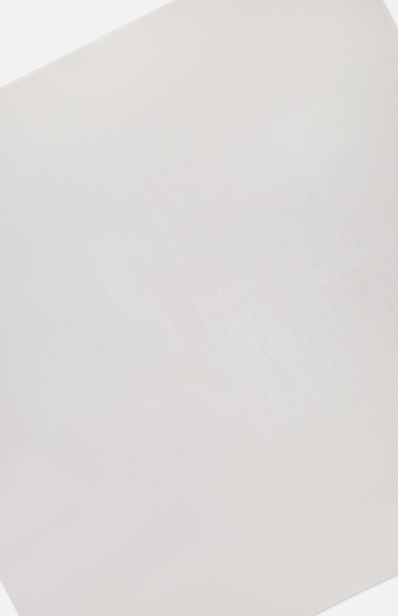 A close-up of the BRUNELLO CUCINELLI Sea Island Cotton Twill Pocket Square, shown against a white background. Its smooth surface and subtle texture are highlighted, showcasing this refined men's formal accessory.