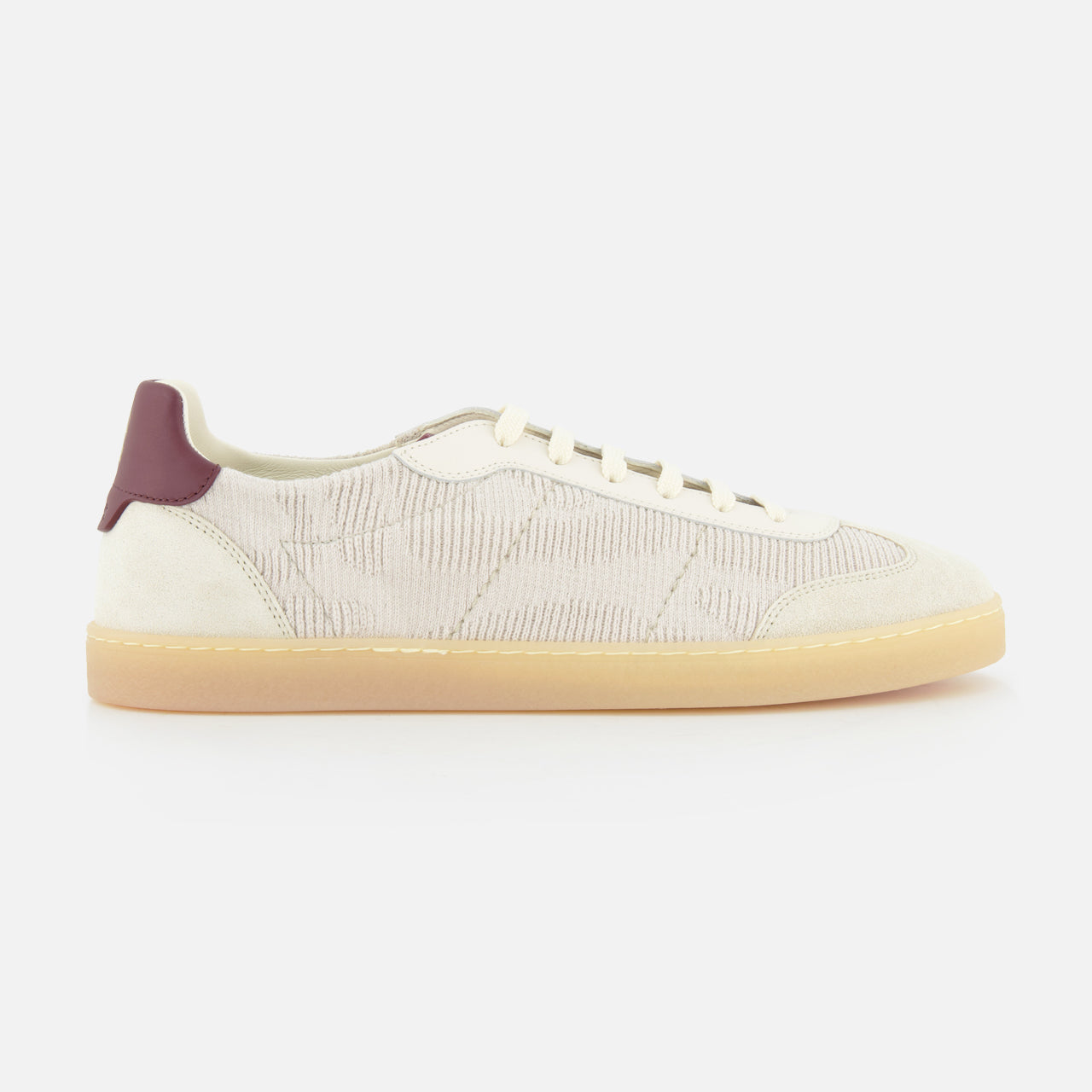 The BRUNELLO CUCINELLI Suede Leather Detailing Sneakers feature beige washed suede with a textured pattern, cream laces, a light tan sole, and a dark burgundy heel accent. Made in Italy and shown on a white background.