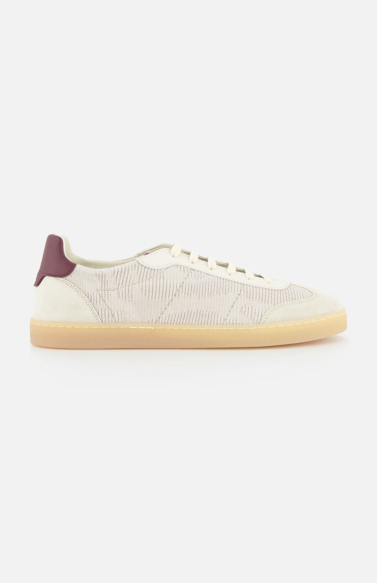 The BRUNELLO CUCINELLI Suede Leather Detailing Sneakers feature beige washed suede with a textured pattern, cream laces, a light tan sole, and a dark burgundy heel accent. Made in Italy and shown on a white background.