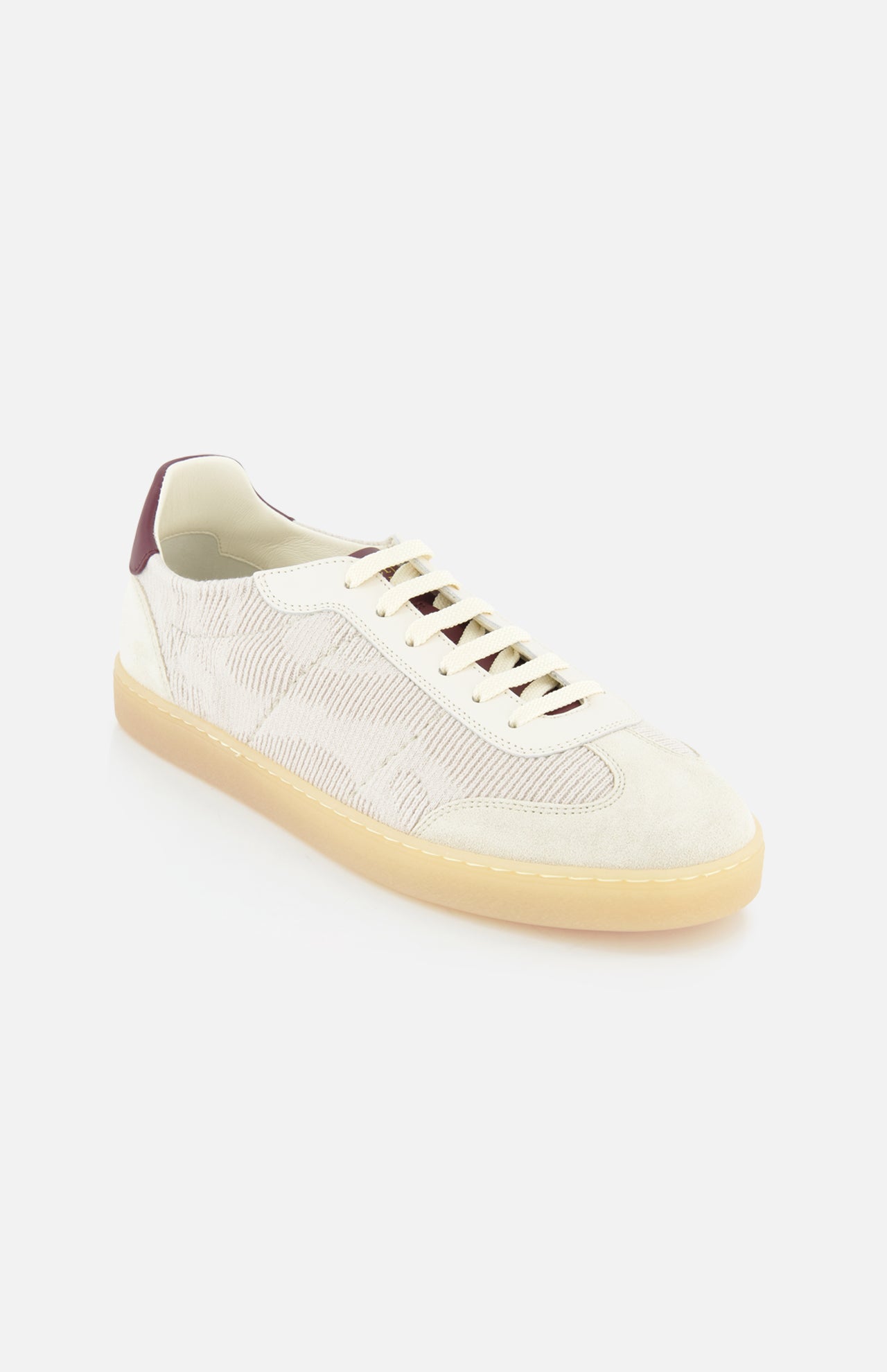 The BRUNELLO CUCINELLI Suede Leather Detailing Sneakers feature a cream hue with white laces, light beige suede and mesh panels, gum sole, and a burgundy heel accent, shown against a white background.
