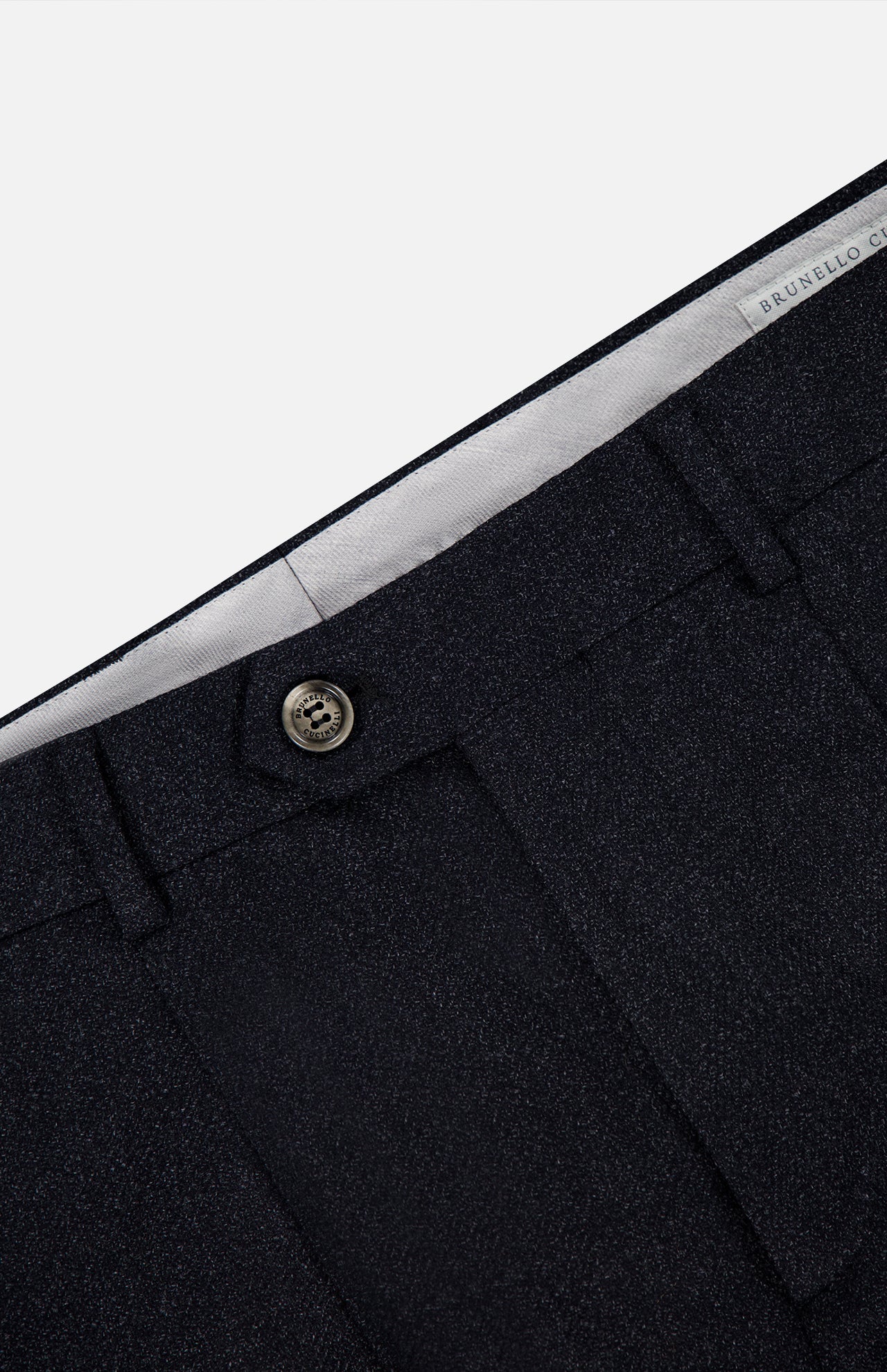Close-up of the waistband and upper front section of the BRUNELLO CUCINELLI Wool Suit Trouser Pant in dark grey, highlighting a button closure, belt loops, and a partially visible brand label inside the waistband.