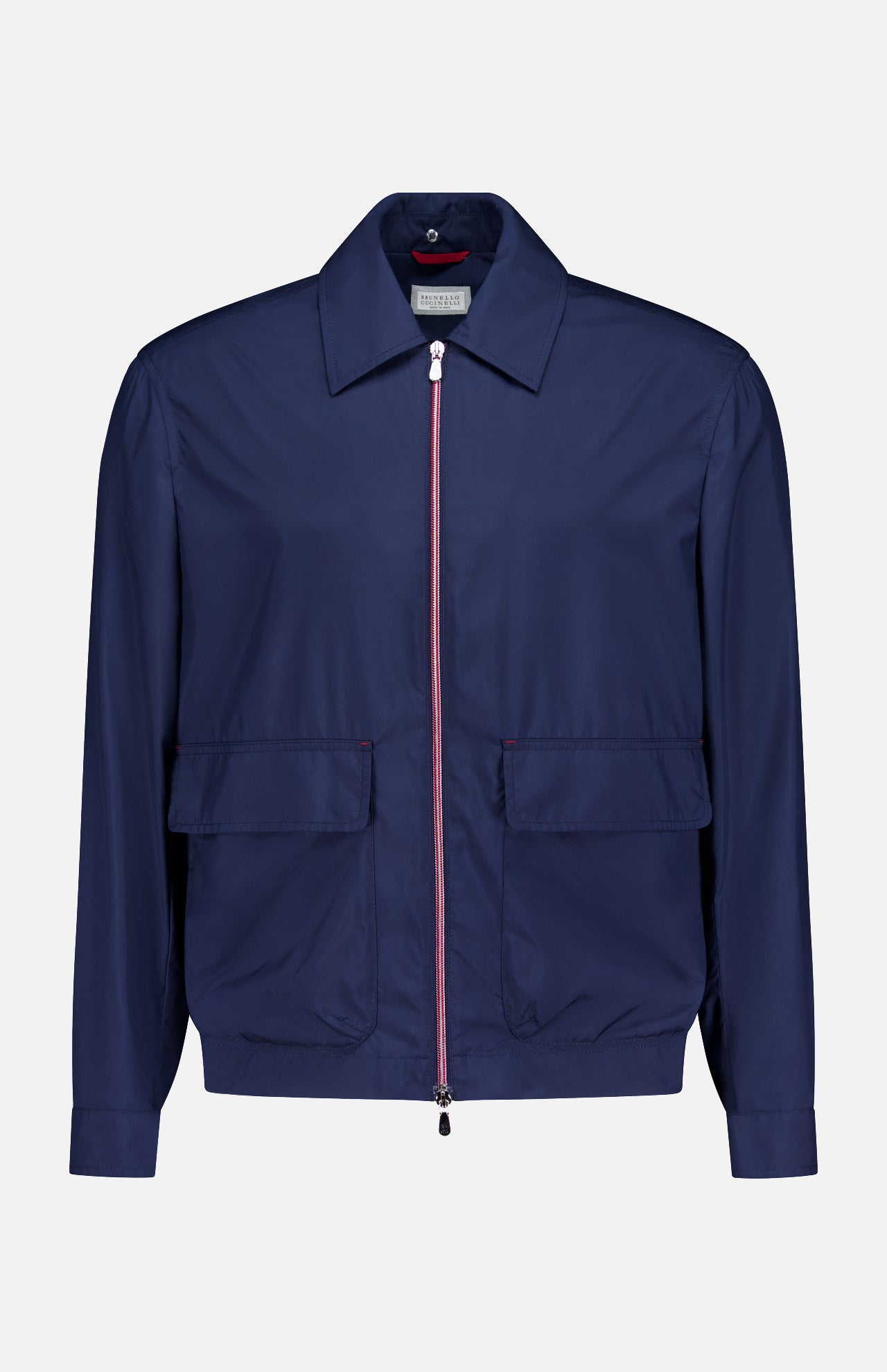 The BRUNELLO CUCINELLI Water Resistant Contrast Zip Jacket is a lightweight men’s navy jacket featuring a classic collar, front zipper, two large front flap pockets, and long sleeves, shown against a plain white background.
