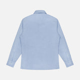 A light blue Cotton and Cashmere Western Shirt by BRUNELLO CUCINELLI is shown from the back, featuring a pointed yoke and buttoned cuffs for a subtle nod to classic western wear, laid flat on a white background.