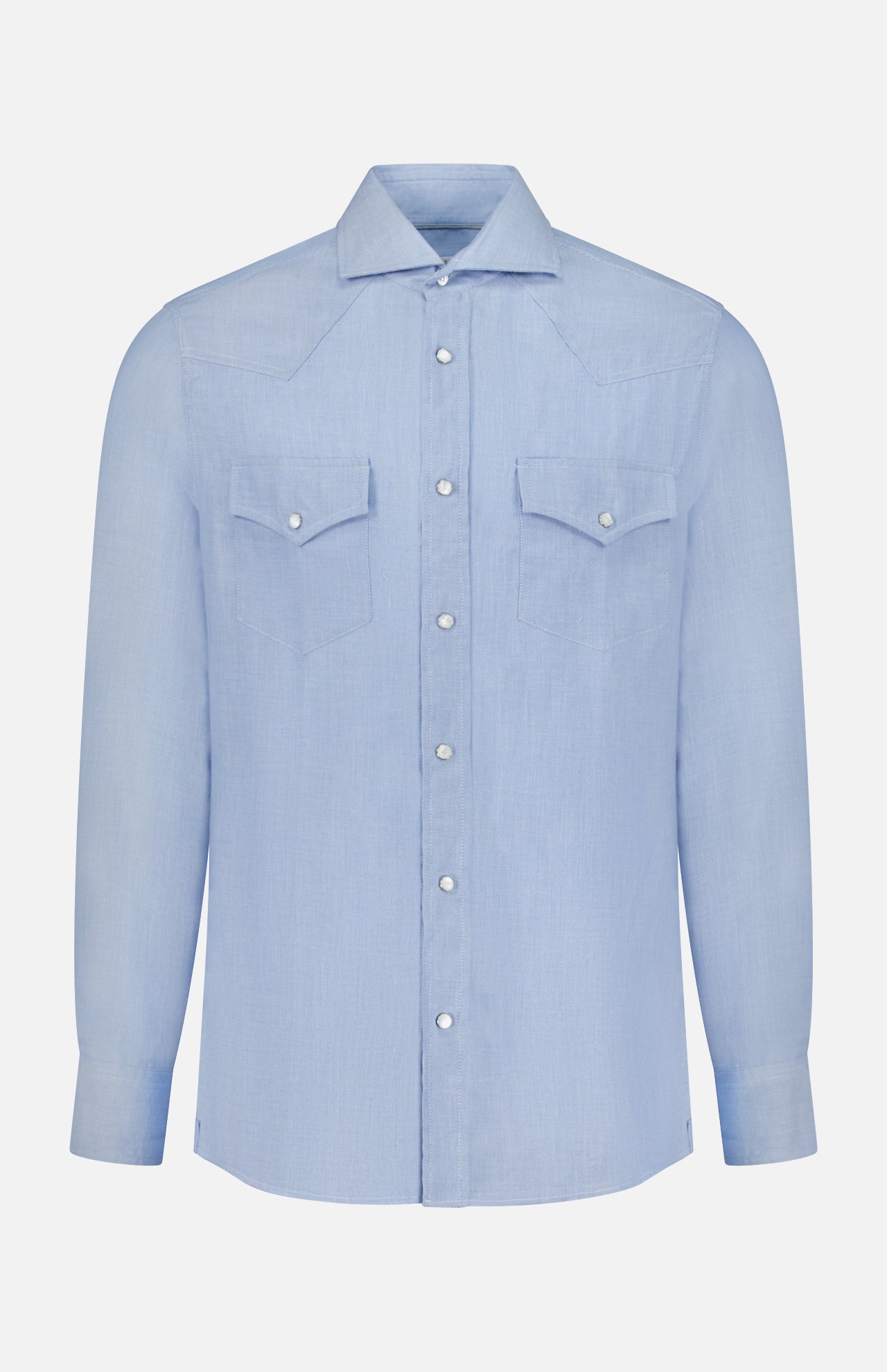 Introducing the Cotton and Cashmere Western Shirt by BRUNELLO CUCINELLI: a light blue, long-sleeve button-up shirt featuring a collar and two front chest pockets with buttoned flaps. Showcasing classic western wear details with a tailored design, this premium shirt is displayed against a plain white background.