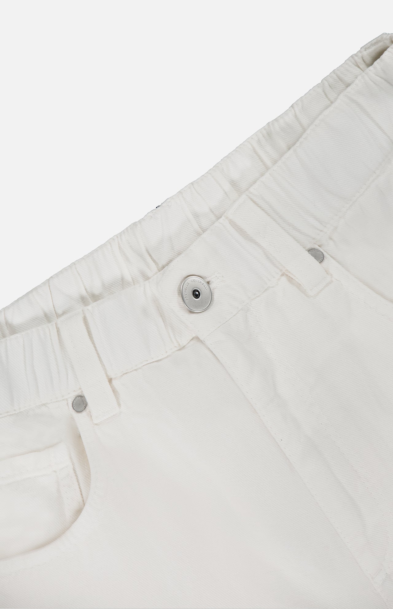 Close-up of BRUNELLO CUCINELLI Piece-Dyed Cotton Pull-On Jeans showcasing an elastic waistband, silver button, belt loops, front pockets, and a classic straight leg fit.