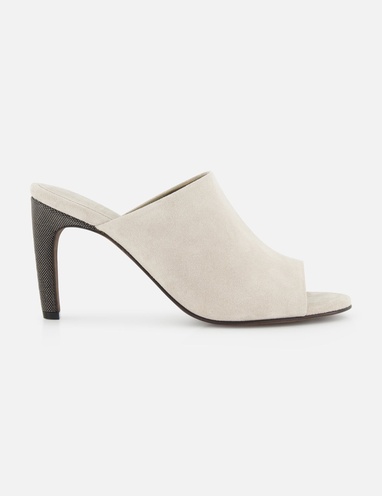 The BRUNELLO CUCINELLI Suede Curved Monili 80MM Mule Heel, in beige suede with a high tapered heel and minimalist slip-on design, is displayed in side view against a white background.