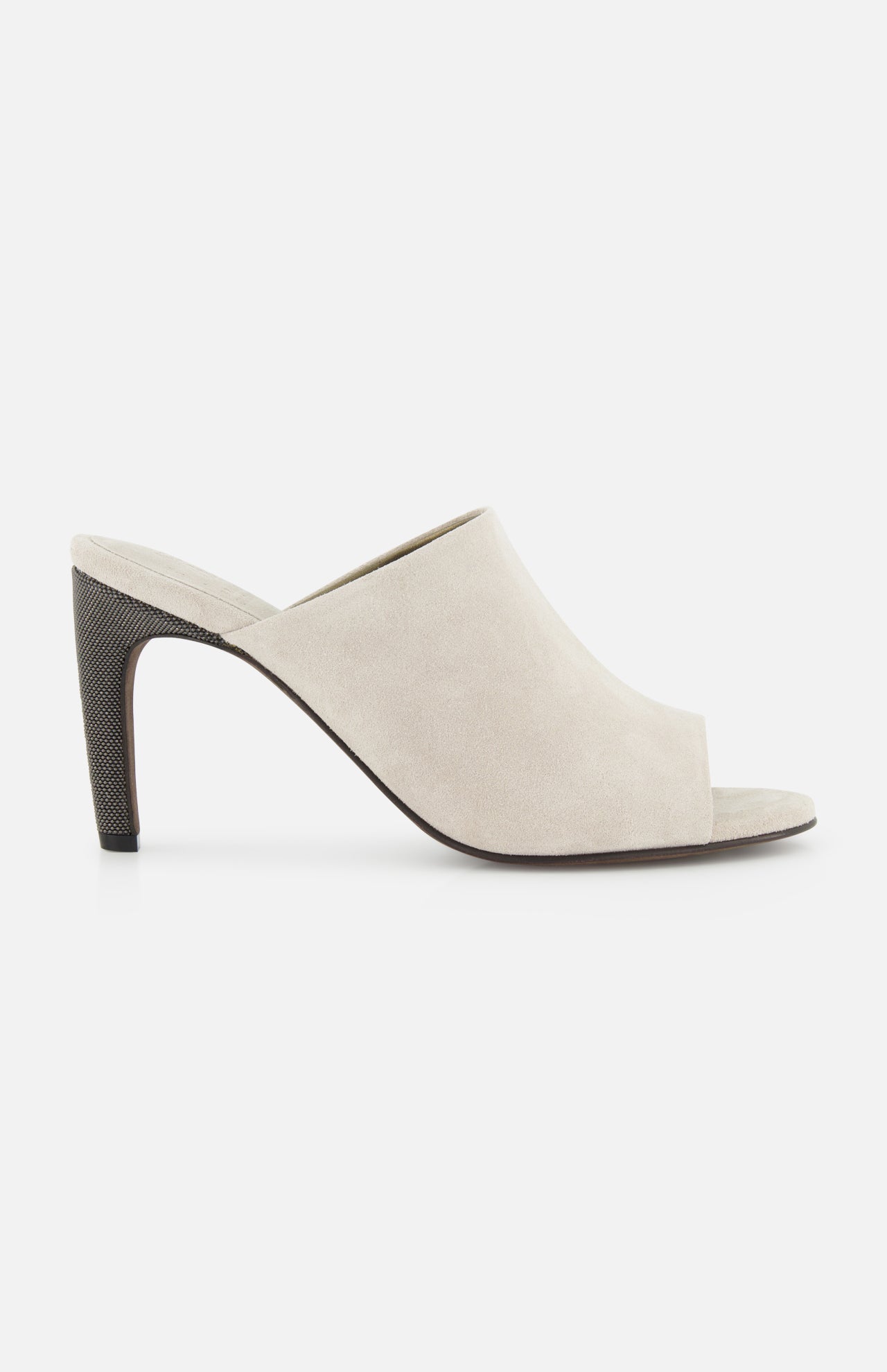 The BRUNELLO CUCINELLI Suede Curved Monili 80MM Mule Heel, in beige suede with a high tapered heel and minimalist slip-on design, is displayed in side view against a white background.