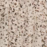 Close-up of the Artemis Animalier Print Silk Pleated Skirt by BRUNELLO CUCINELLI, featuring soft, light beige silk fabric with abstract brown and gray spotted patterns reminiscent of animal print. The skirt appears slightly sheer with elegant pleats and a gathered waistband—perfect for a sophisticated midi skirt look.