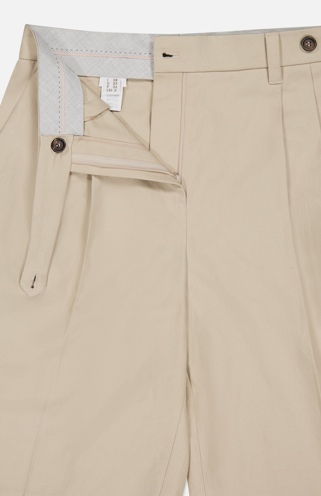 A pair of BRUNELLO CUCINELLI Cotton Linen Bull Bermuda Pleated Shorts in beige, partially unzipped and unbuttoned to reveal the inner waistband, fly with buttons, zipper, and interior lining detail.
