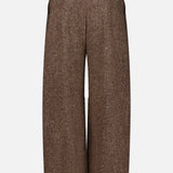 The Donegal Wool Barrel Pleated Pant by BRUNELLO CUCINELLI features a wide-leg, high-waist silhouette in brown tweed wool, detailed with belt loops and side pockets, showcased from the front against a plain white background in true Brunello Cucinelli style.