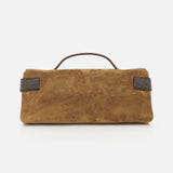 The Essence Suede Top Handle Clutch by BRUNELLO CUCINELLI is a brown suede bag featuring a refined top handle and subtle dark accents on each side, showcased against a plain white background. Expertly crafted in Italy, this elegant accessory exemplifies timeless style and exquisite craftsmanship.