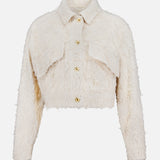 The Fuzzy Cotton Bull Cropped Jacket by BRUNELLO CUCINELLI is a light beige, textured long-sleeve jacket with gold buttons, a collar, and two chest flap details—a chic update to the fuzzy denim trend.