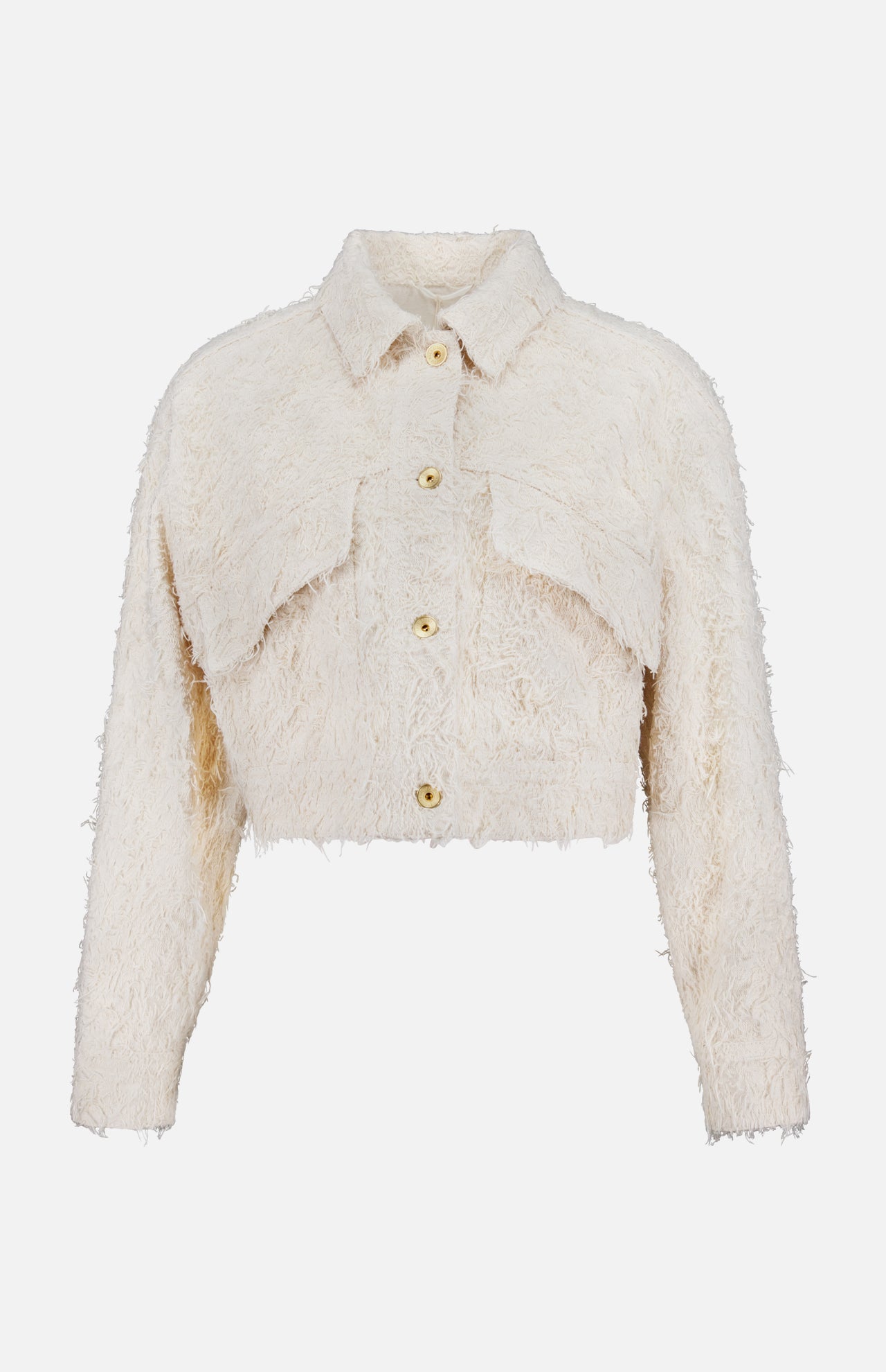 The Fuzzy Cotton Bull Cropped Jacket by BRUNELLO CUCINELLI is a light beige, textured long-sleeve jacket with gold buttons, a collar, and two chest flap details—a chic update to the fuzzy denim trend.