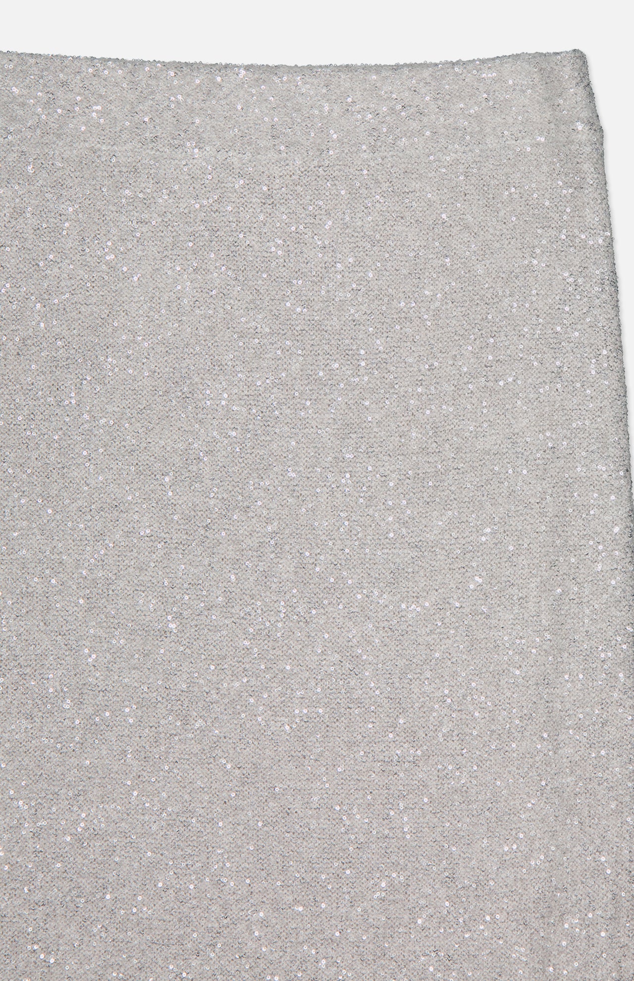 Close-up of BRUNELLO CUCINELLI's Linen Mohair Diamante Knit Pencil Skirt, showing its light grey, sparkly texture and subtle glittery finish—a chic choice for cocktail parties. Flat rectangular section with a slightly uneven top edge shown.