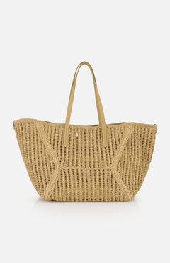 The Medium Duo Raffia Tote Bag by BRUNELLO CUCINELLI features two tan leather handles and a woven raffia design, shown against a white background—an ideal companion for sunny days at the beach.