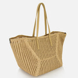 The Medium Duo Raffia Tote Bag by BRUNELLO CUCINELLI is a tan, woven raffia bag with two long, flat handles and an open-top design—ideal for carrying summer essentials in style. Displayed on a white background.