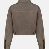 Back view of the No Fade Indigo Cropped Jacket by BRUNELLO CUCINELLI in cotton denim, featuring buttoned cuffs, side adjuster tabs at the waist, and a straight collar on a plain white background.