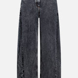 The BRUNELLO CUCINELLI Prince Of Whales Embossed Wide Barrel Jean features a high-waisted, wide-leg silhouette in black with a faded, embossed pattern inspired by the Prince of Wales design. These jeans are detailed with front pockets, belt loops, and a button-and-zipper closure and are displayed against a white background.
