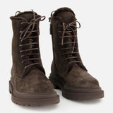 A pair of BRUNELLO CUCINELLI Shearling Lined Lace Boots with Monili Tabs in dark chocolate brown suede, featuring rugged soles and a plush shearling lining, displayed against a plain white background.