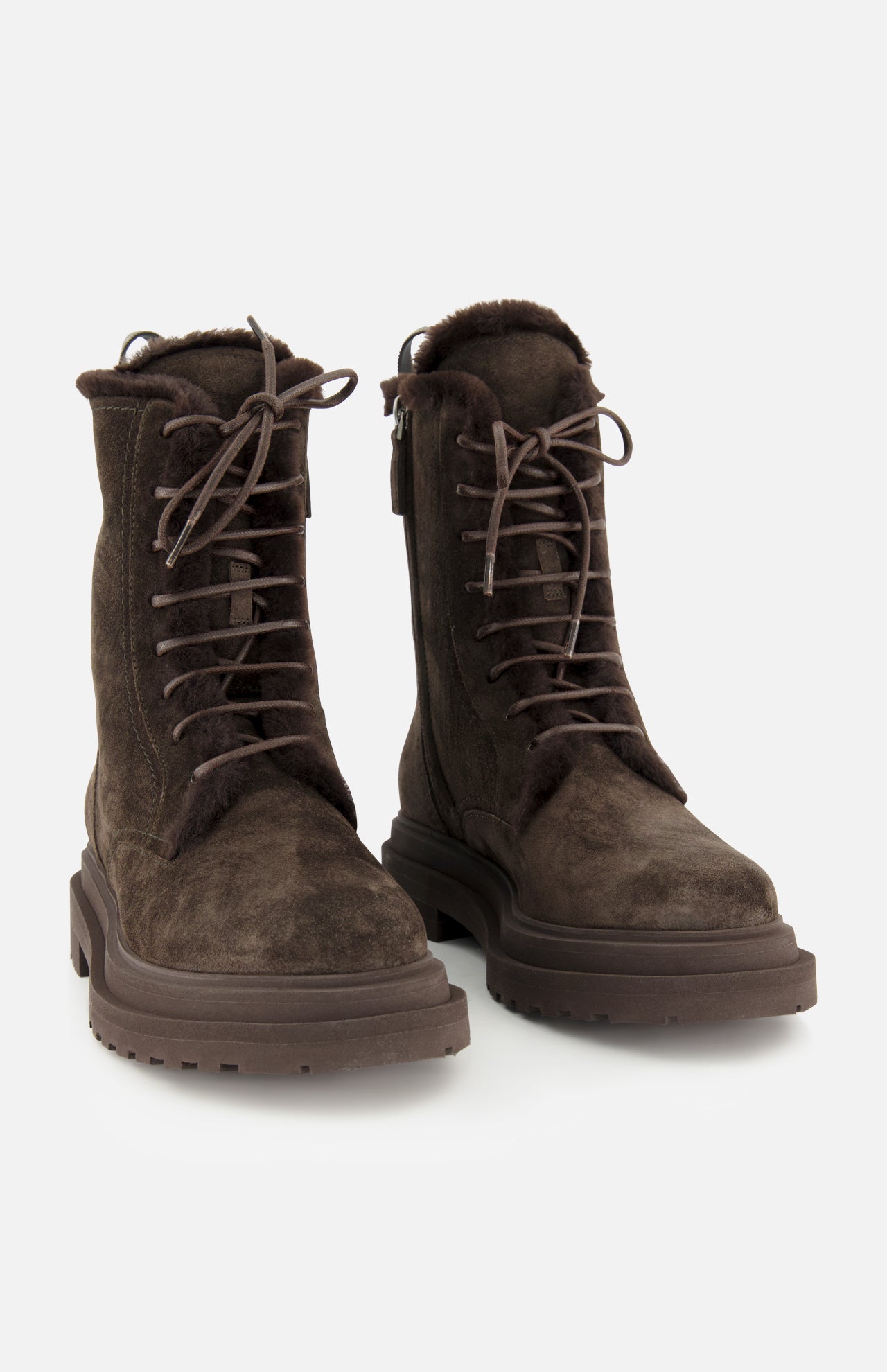 A pair of BRUNELLO CUCINELLI Shearling Lined Lace Boots with Monili Tabs in dark chocolate brown suede, featuring rugged soles and a plush shearling lining, displayed against a plain white background.