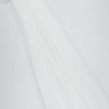 A close-up of the BRUNELLO CUCINELLI Silk Long Sleeve Blouse showcases flowing white silk fabric with a high gathered neckline, accented by a sparkling, beaded band evocative of monili embroidery. The luxurious material drapes elegantly across a plain background, highlighting the refined silhouette of this blouse.