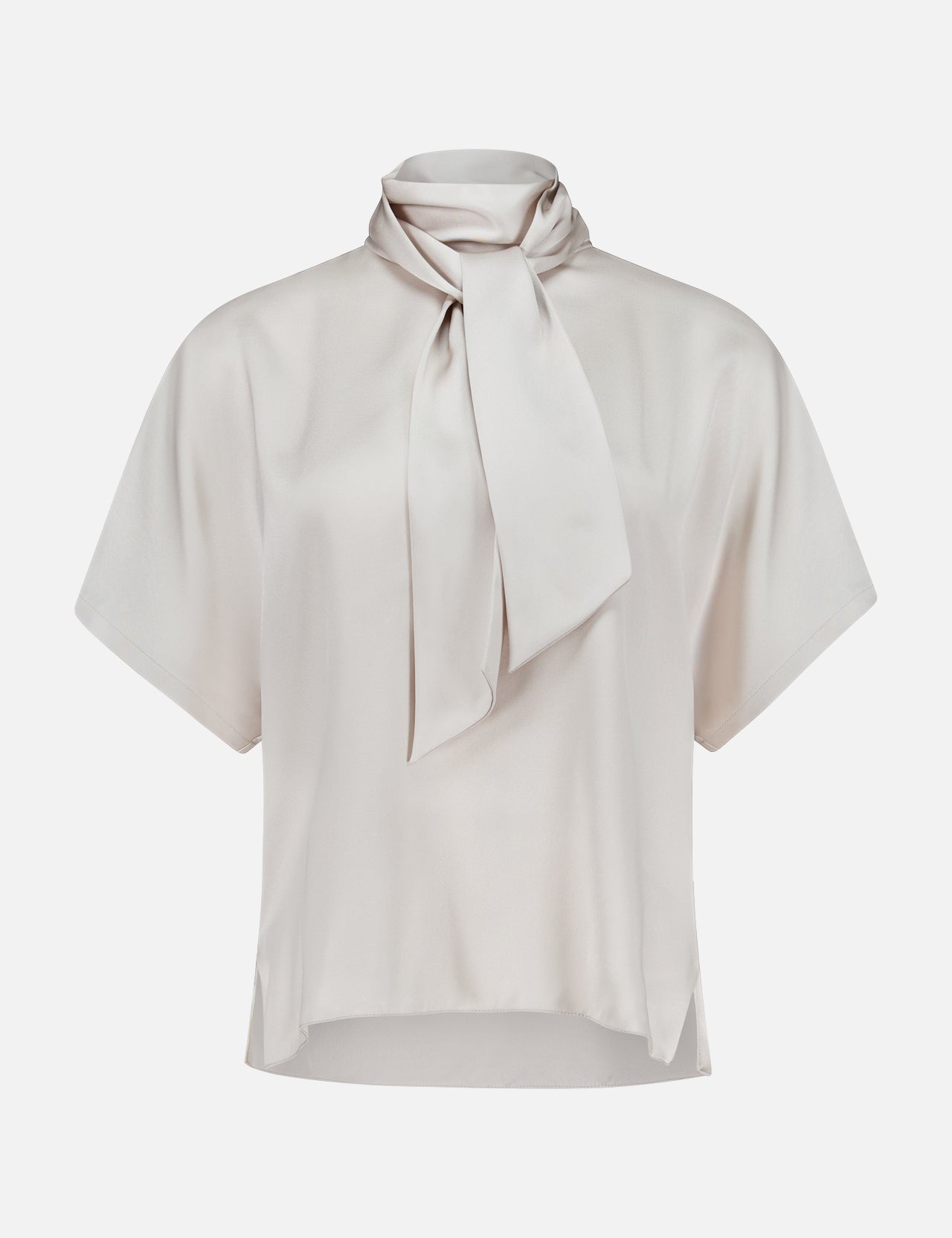 The BRUNELLO CUCINELLI Silk Satin Short Sleeve Blouse in light beige features a loose fit, short sleeves, and a high neck tie detail, shown against a plain white background.