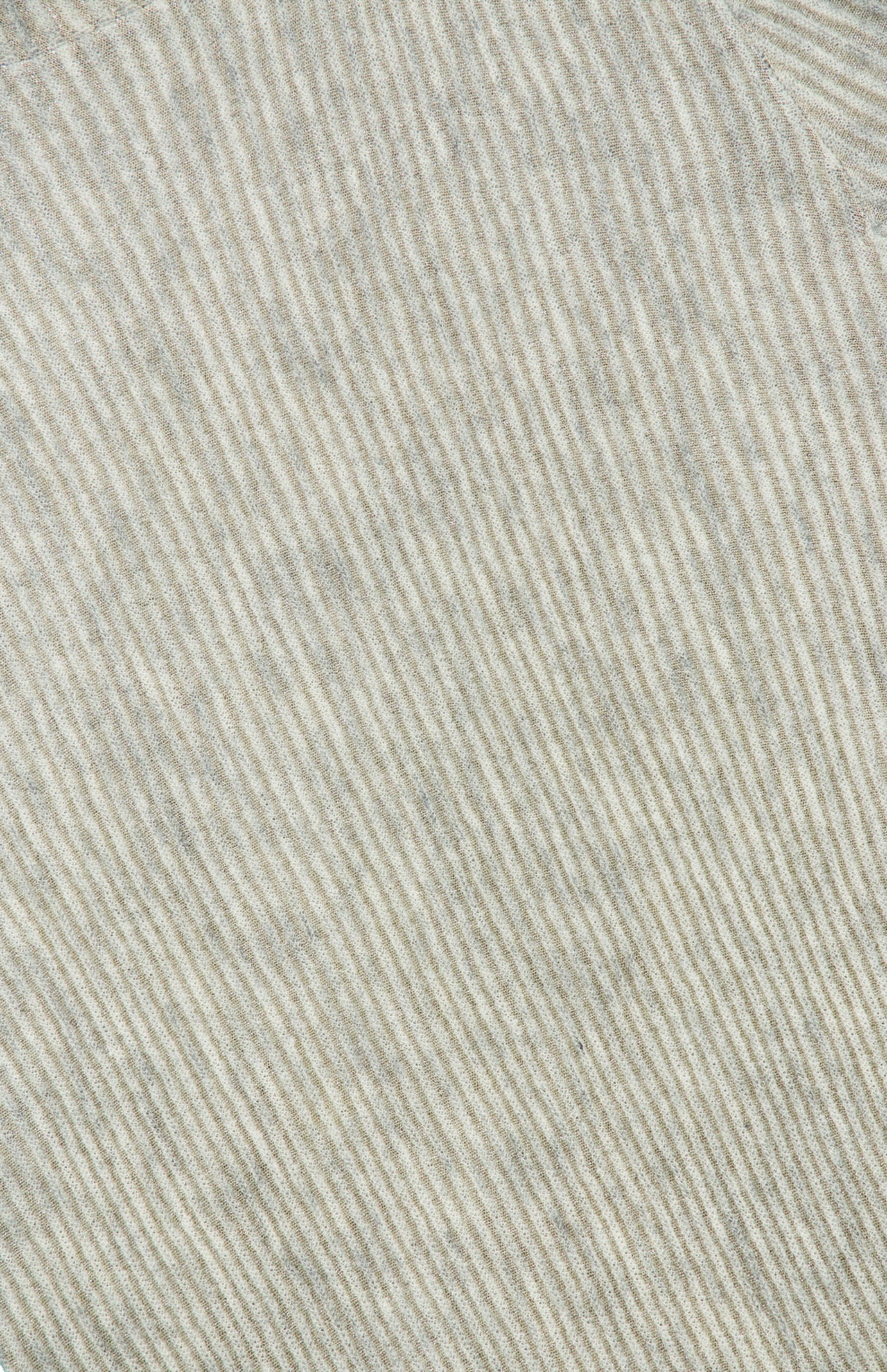 A close-up of the BRUNELLO CUCINELLI Silk Wool Rib Mockneck Top reveals a textured fabric detailed with diagonal, thin, light gray and white stripes, creating a subtle and soft pattern that embodies the quiet sophistication and elegance of luxury.