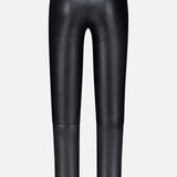 The BRUNELLO CUCINELLI Stretch Leather Legging is showcased from the back, highlighting its high waistband and cropped ankle-length silhouette in black faux leather. Presented against a plain light gray background, these leggings offer a sleek and modern touch to contemporary womenswear.