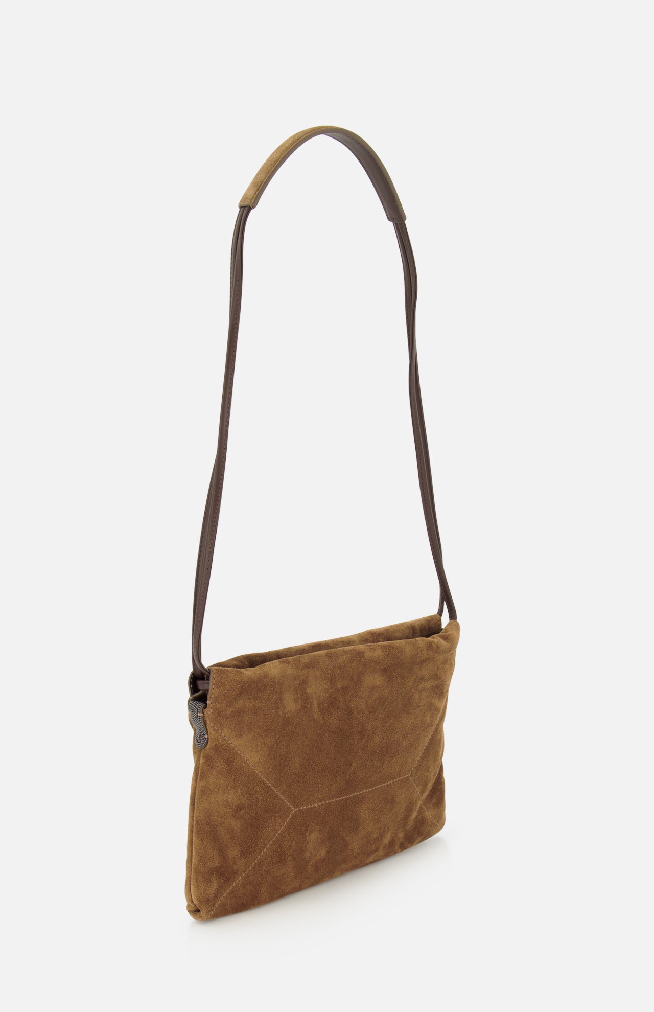 The Suede Mini Pouchette with Monili by BRUNELLO CUCINELLI stands upright against a plain white background. Crafted in a warm caramel-toned brown suede, the bag features a simple rectangular silhouette with visible front stitching and is finished with a long, dark strap—capturing Brunello Cucinelli’s signature sense of refinement.