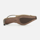 A taupe BRUNELLO CUCINELLI Suede Wrap Slingback Heel shown from the bottom, featuring a pointed toe, textured suede heel, and dark rubber sole inserts for added grip on the forefoot and heel.