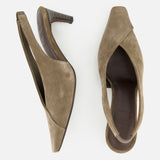 A pair of BRUNELLO CUCINELLI Suede Wrap Slingback Heels is displayed on a white background, with one shoe standing upright and the other positioned on its side to showcase both the top and side views.