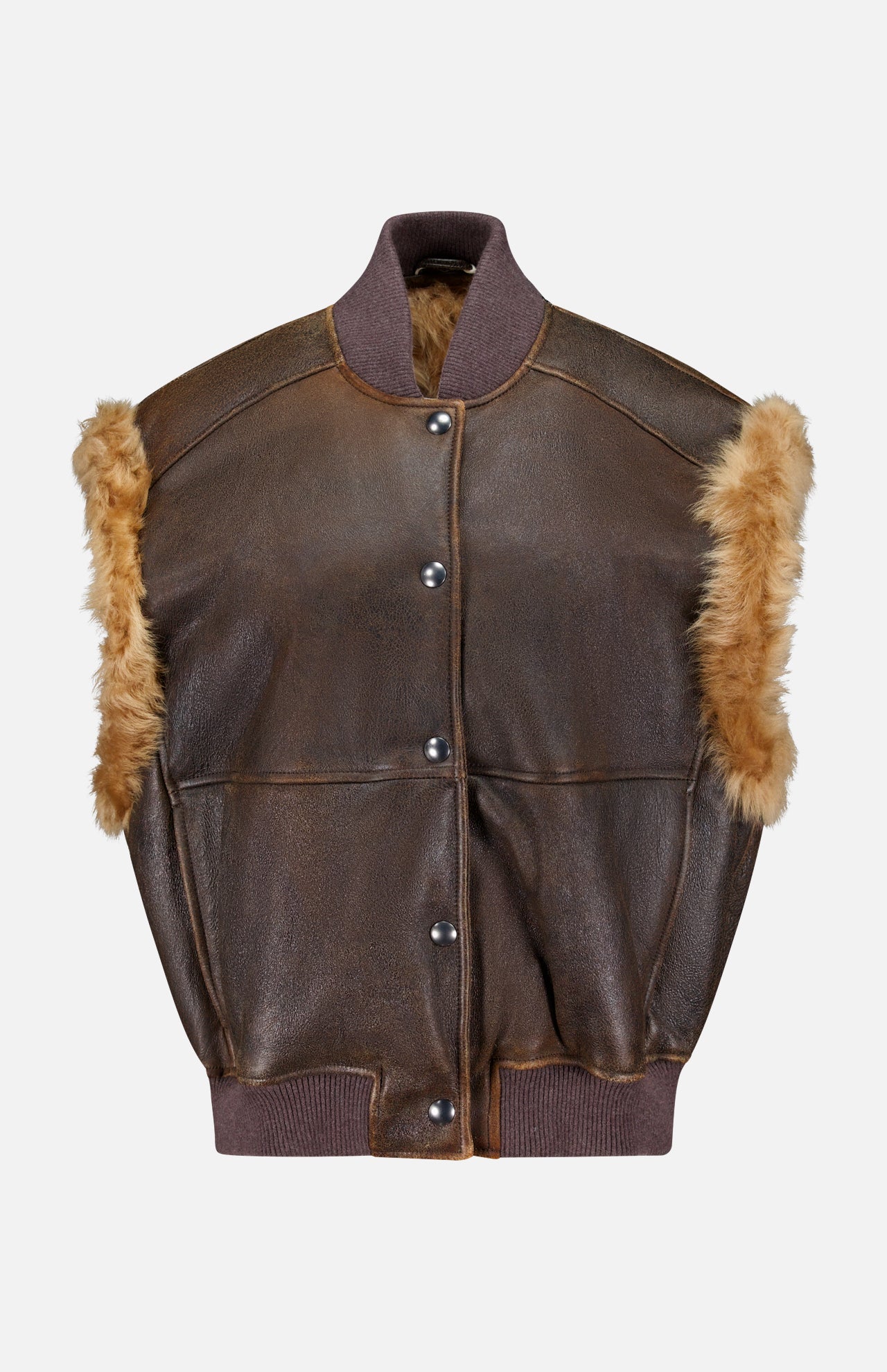 The Vintage Aviator Shearling Vest from BRUNELLO CUCINELLI features a brown leather exterior with tan fur trim along the armholes, a dark ribbed collar and hem, and snap button front closure. This aviator-style vest is finished with classic details and a cozy shearling lining for enhanced warmth and comfort.